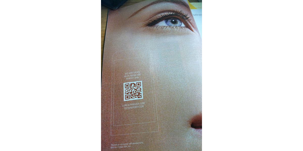 L'oreal print ad campaign with a QR Code on it.