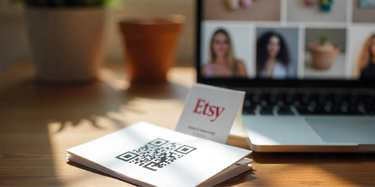 An Etsy QR Code on a paper.