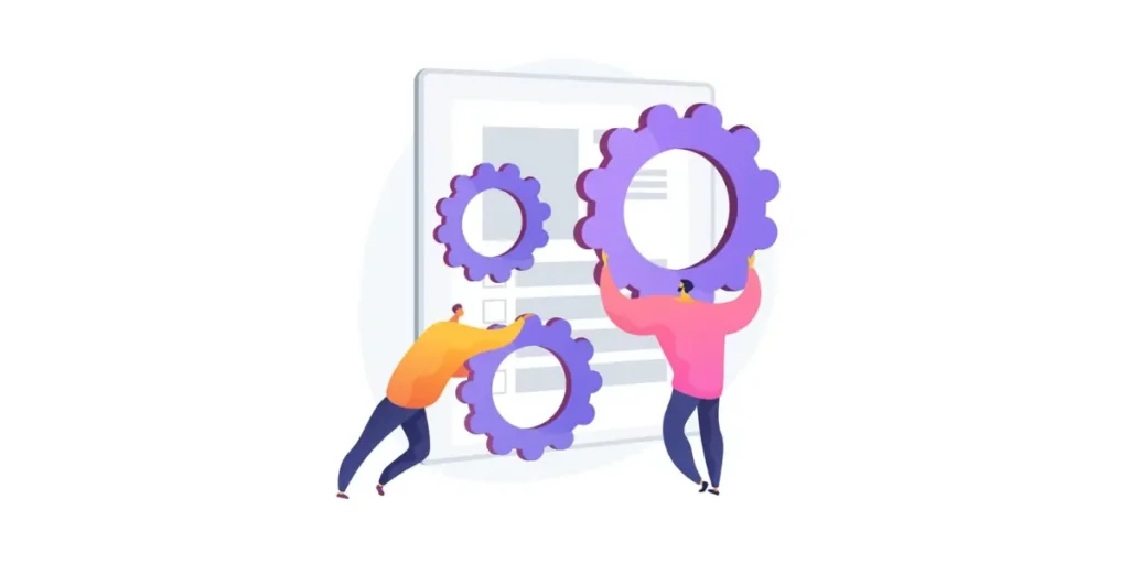 two people lifting and pushing giant gears in front of a screen