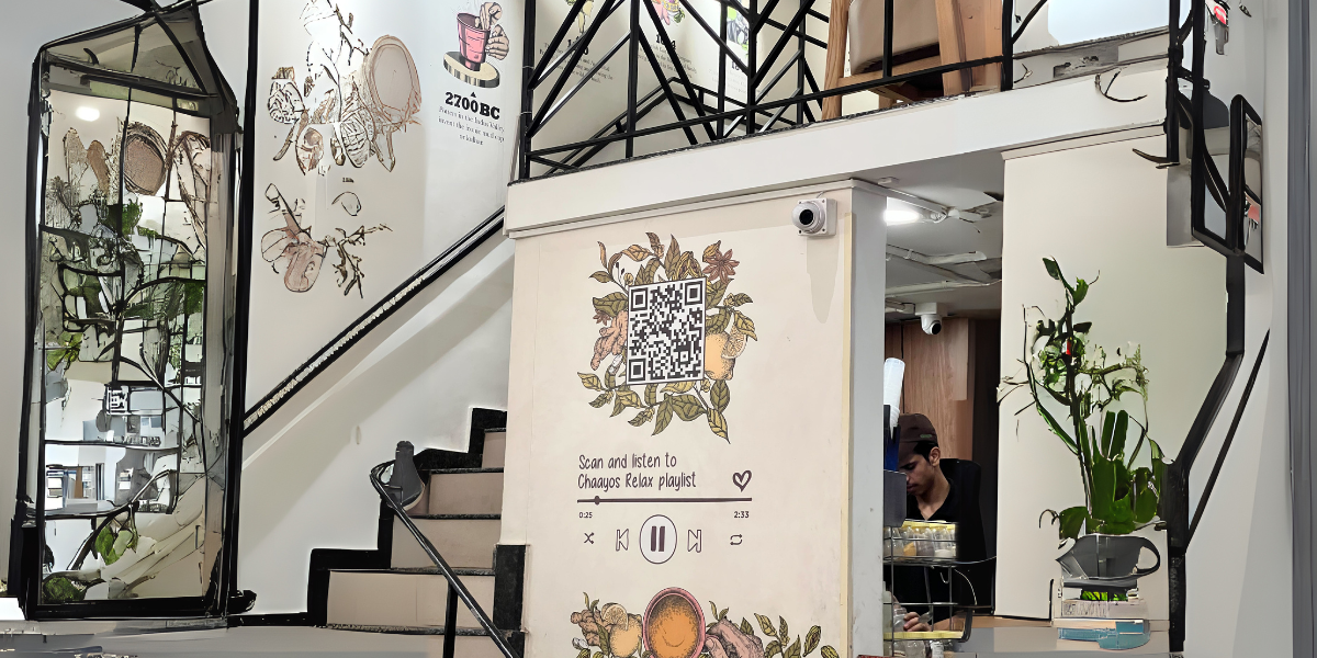 QR Code display ideas featuring a Spotify playlist QR Code wall mural.