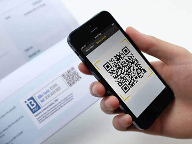 People Scanning QR Code