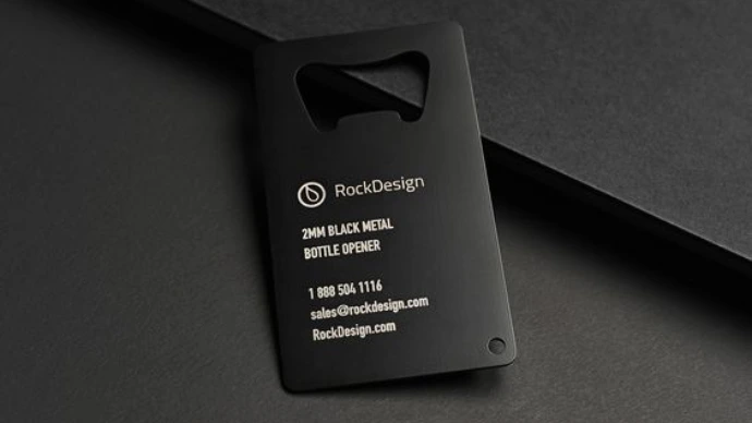 Two brown eco friendly wooden business cards